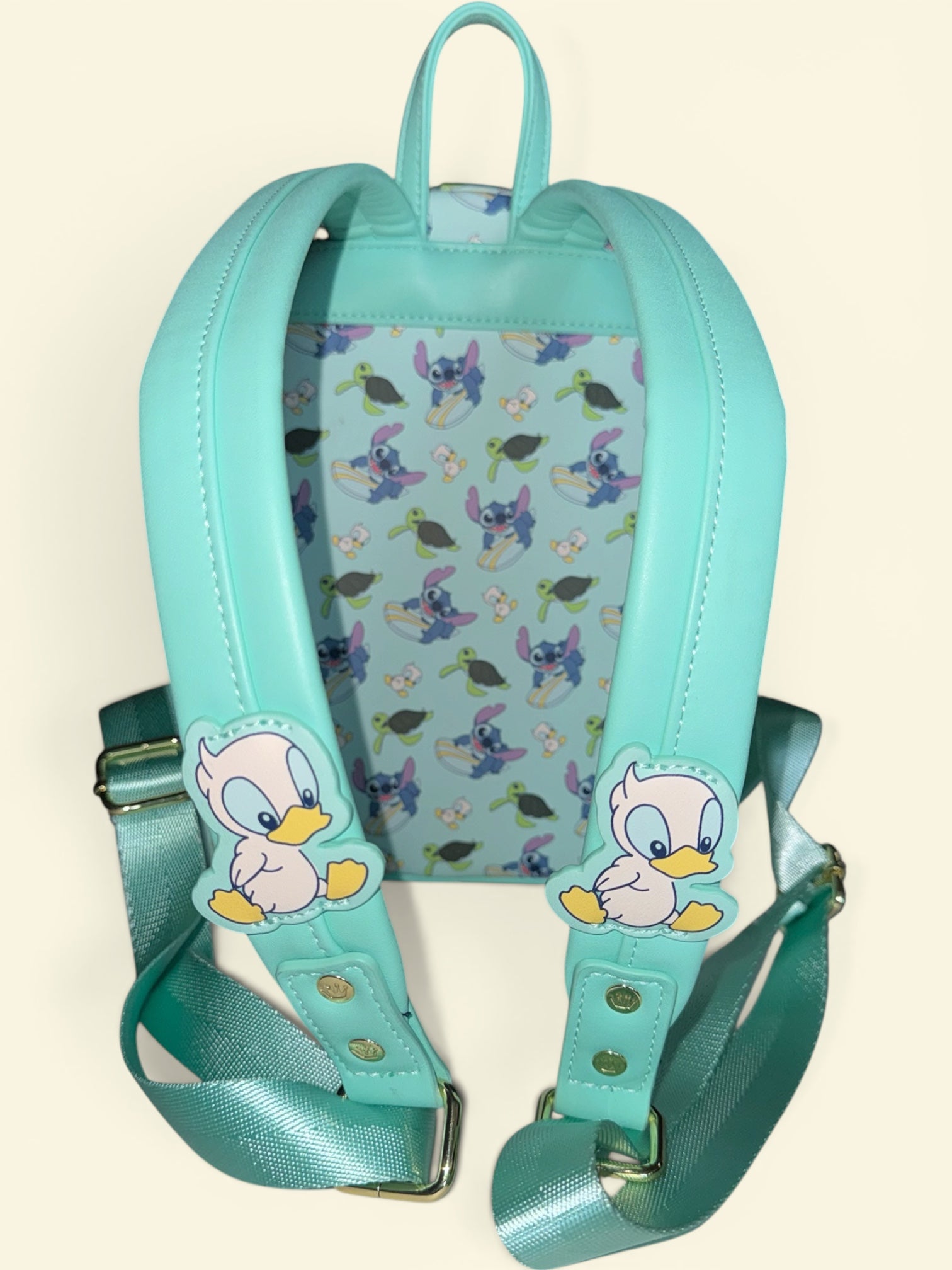 Loungefly Disney Lilo & Stitch Animal Friends Mini Backpack – Stitch Surfing with Ducklings & Sea Turtles