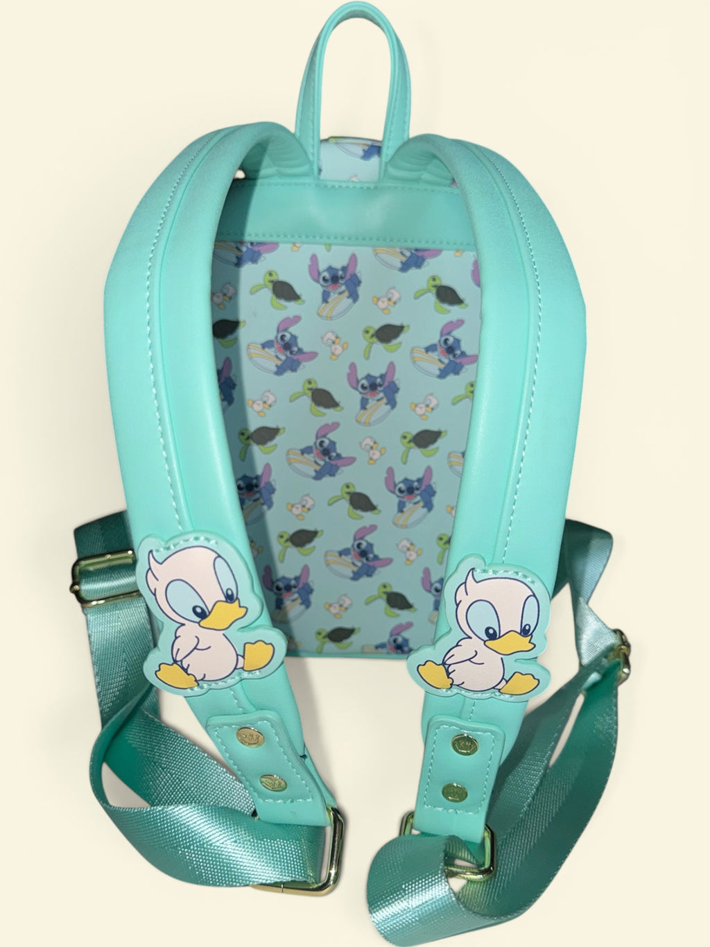Loungefly Disney Lilo & Stitch Animal Friends Mini Backpack – Stitch Surfing with Ducklings & Sea Turtles