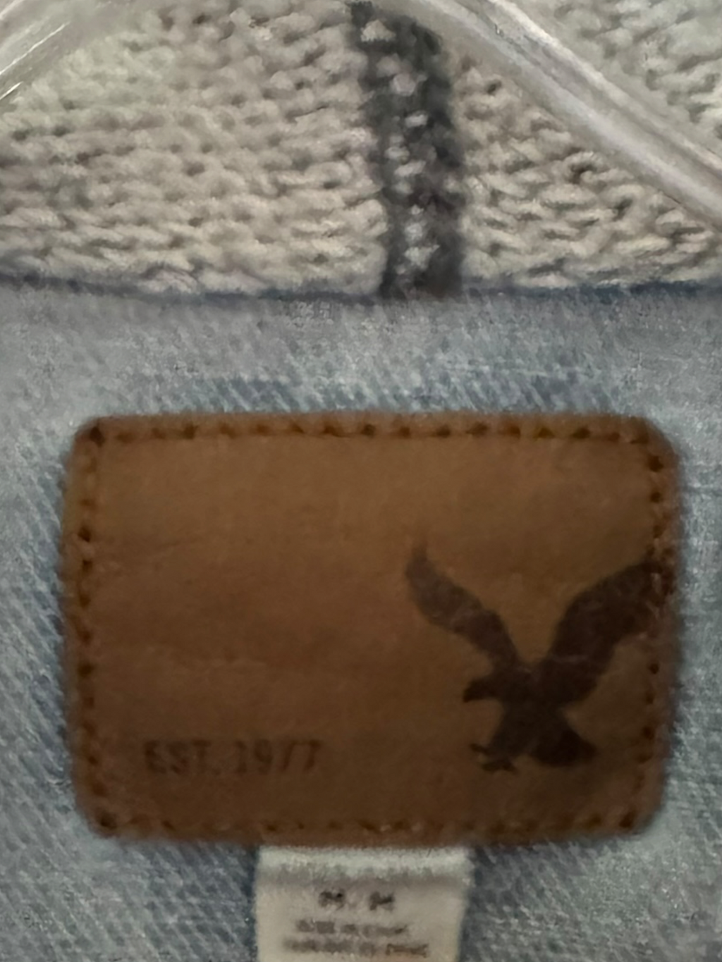 American Eagle Light-Wash Denim Jacket with Gray Hood & Knit Sleeves