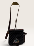 Consuela Black Quilted Crossbody Bag with Embroidered Logo & Tassel